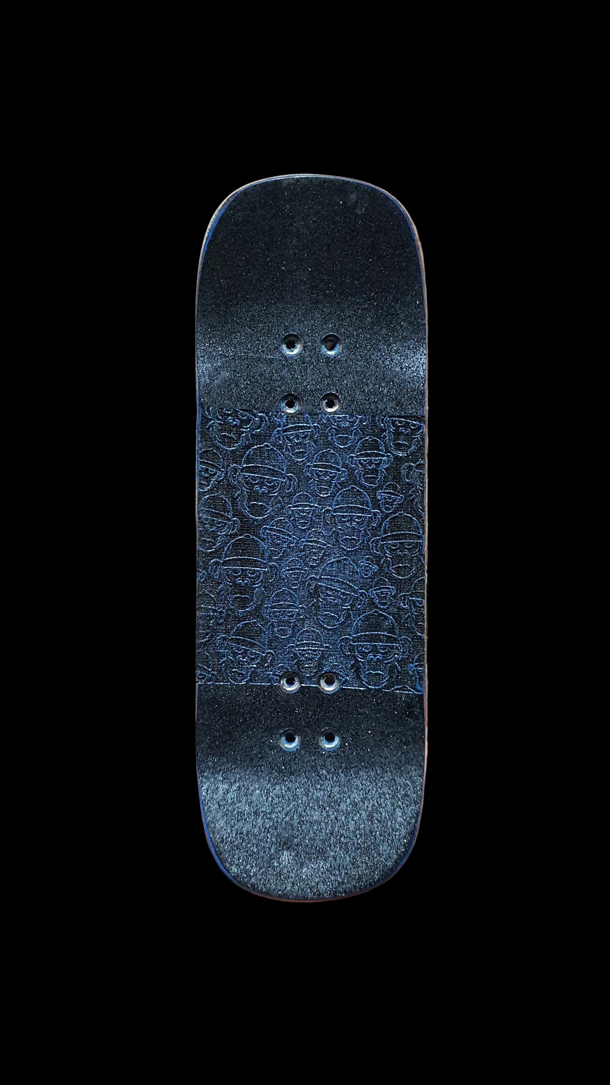 Fingerboard deck top with dark blue patterned grip and eight mounting holes