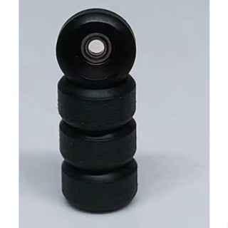 Set of four miniature black fingerboard wheels stacked vertically.