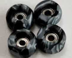 Four marbled black and grey fingerboard wheels with metal bearings