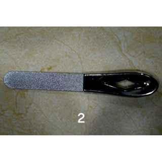 A fingerboard grip tape applicator tool with a grey abrasive surface and black handle.