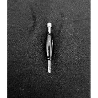 Professional fingerboard tool for adjusting trucks and wheels on a dark background