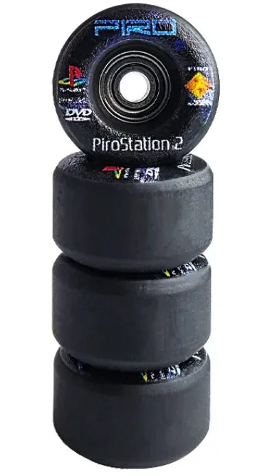 Stack of black PiroStation 2 fingerboard wheels with colorful graphics.