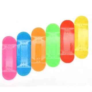 Set of colorful translucent fingerboard decks in pink, blue, orange, green, red, and yellow