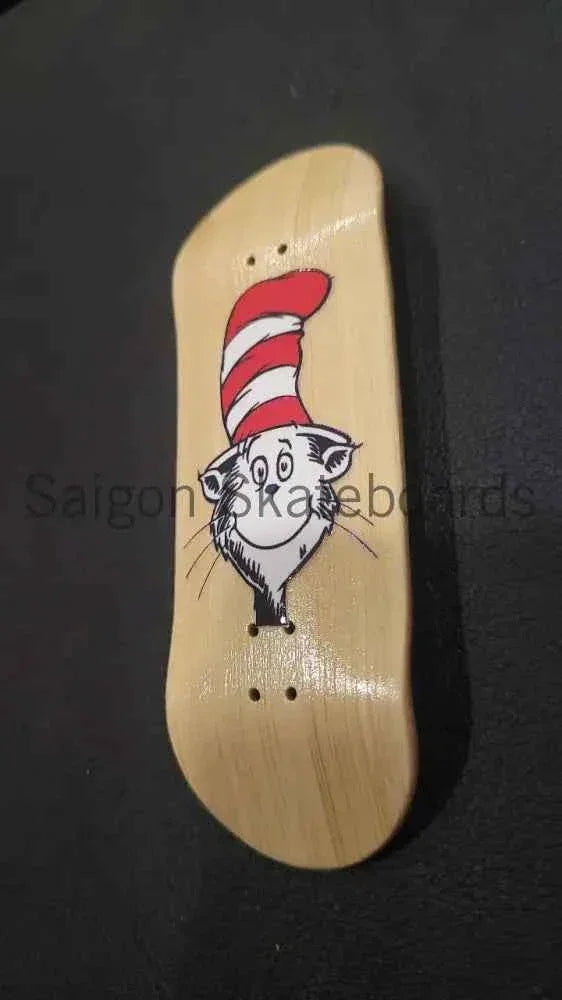 Handmade wooden fingerboard deck featuring a Cat in the Hat illustration.