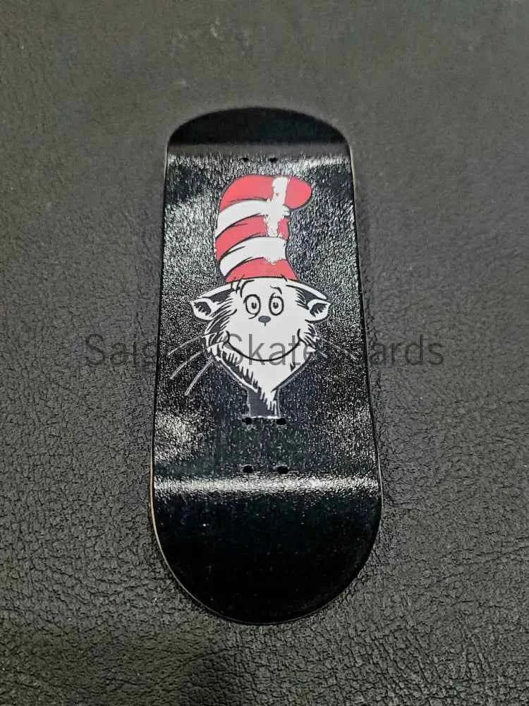 Fingerboard deck with a graphic of a cat wearing a red and white striped hat