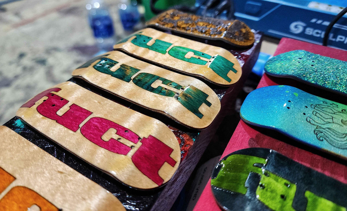 Custom handmade fingerboard decks with colorful graphic prints and designs