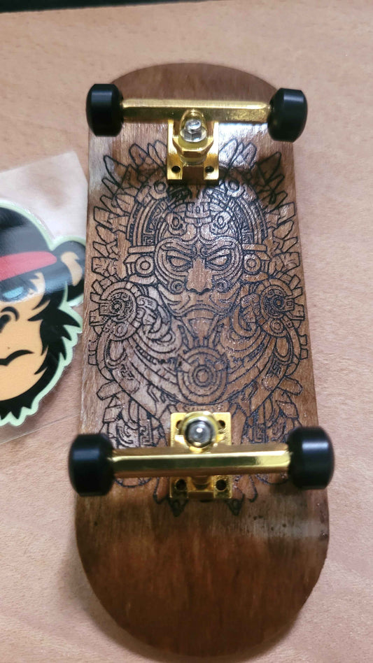 Elevate Your Skills with the Ornate Aztec Warrior Fingerboard Deck - 34mm