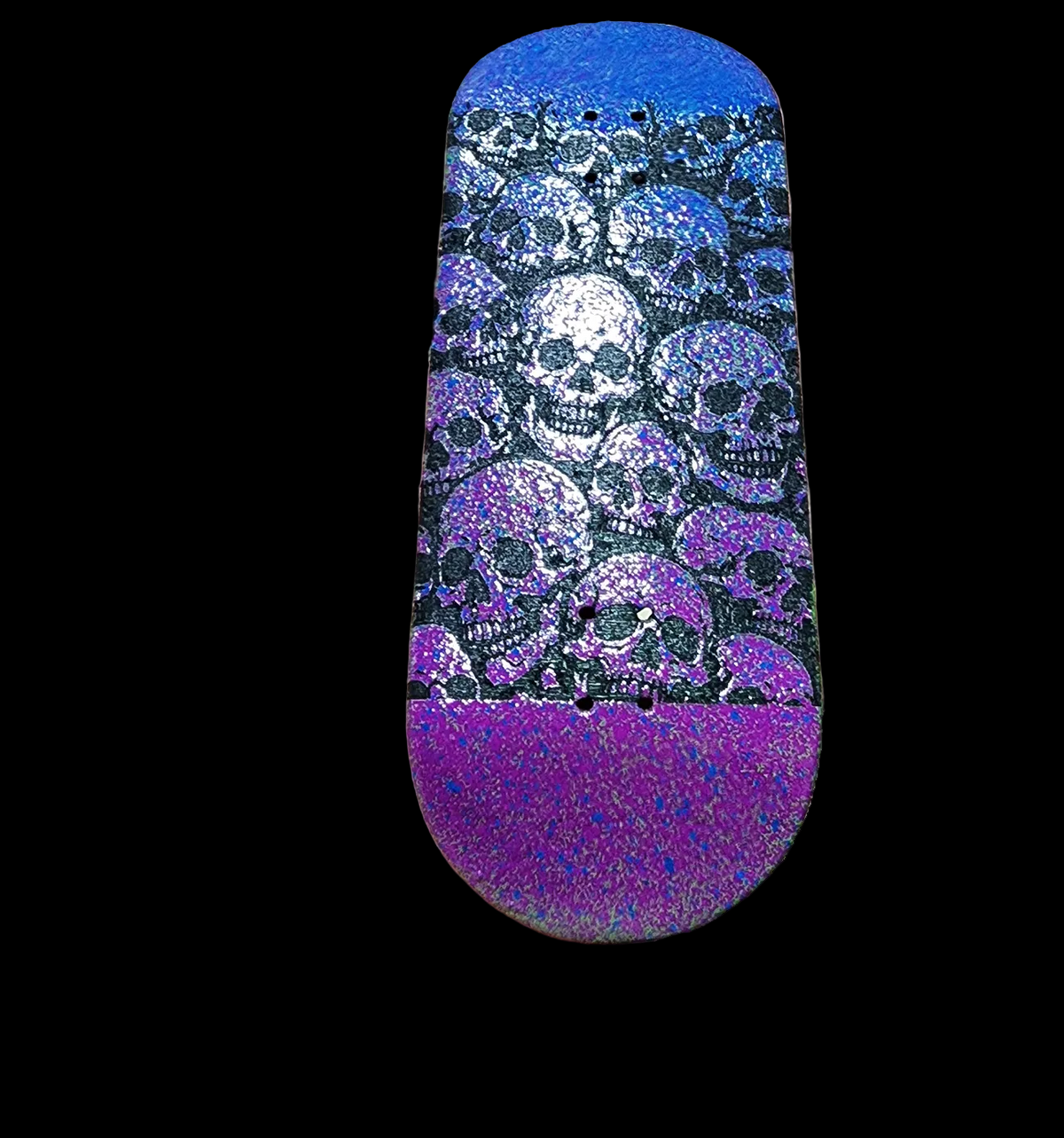 Custom fingerboard deck with a purple and blue skull pattern design.