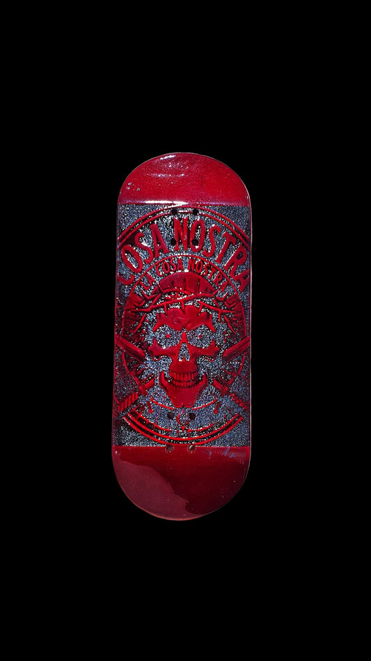 Red fingerboard deck front view with Cosa Nostra skull emblem