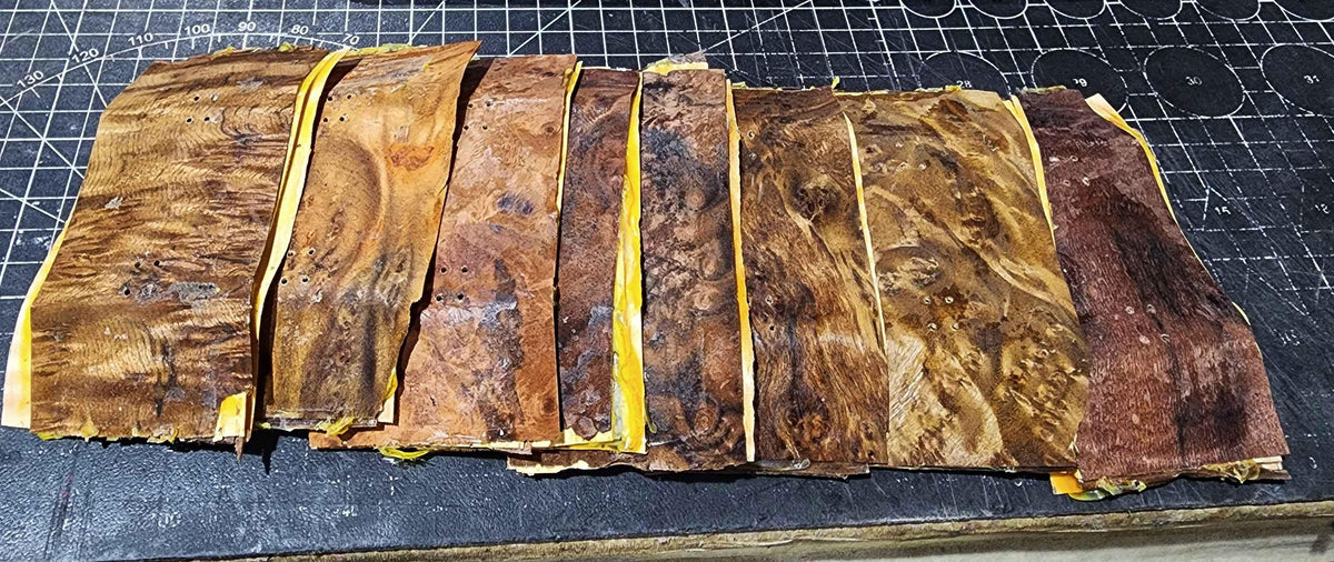 Assorted handmade custom fingerboard wood veneer sheets for deck making.