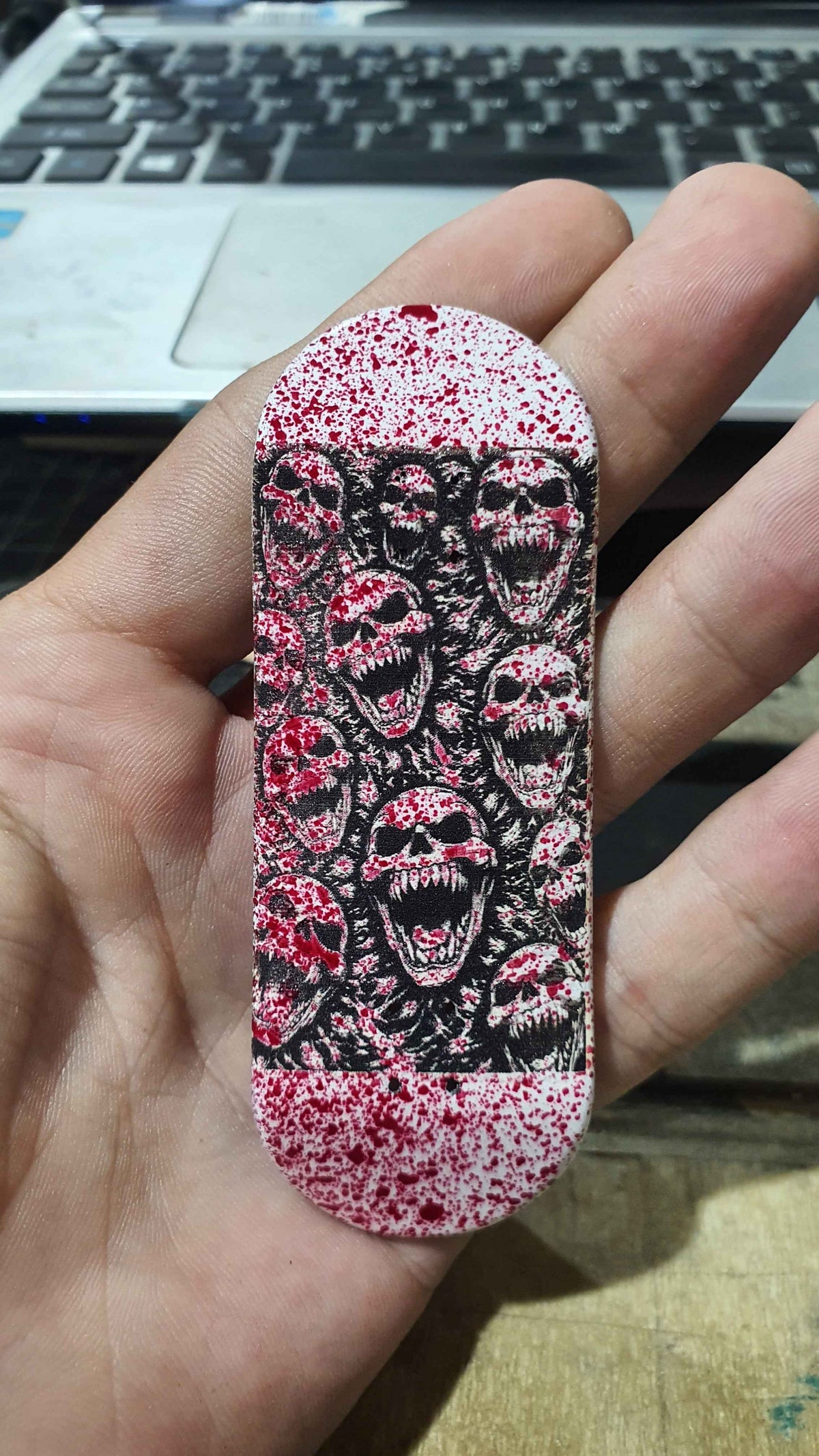 Saigon Skateboards "Blood Spatter" 5-ply Canadian Maple 34mmx99mm popsicle shape with medium kicks and concave.