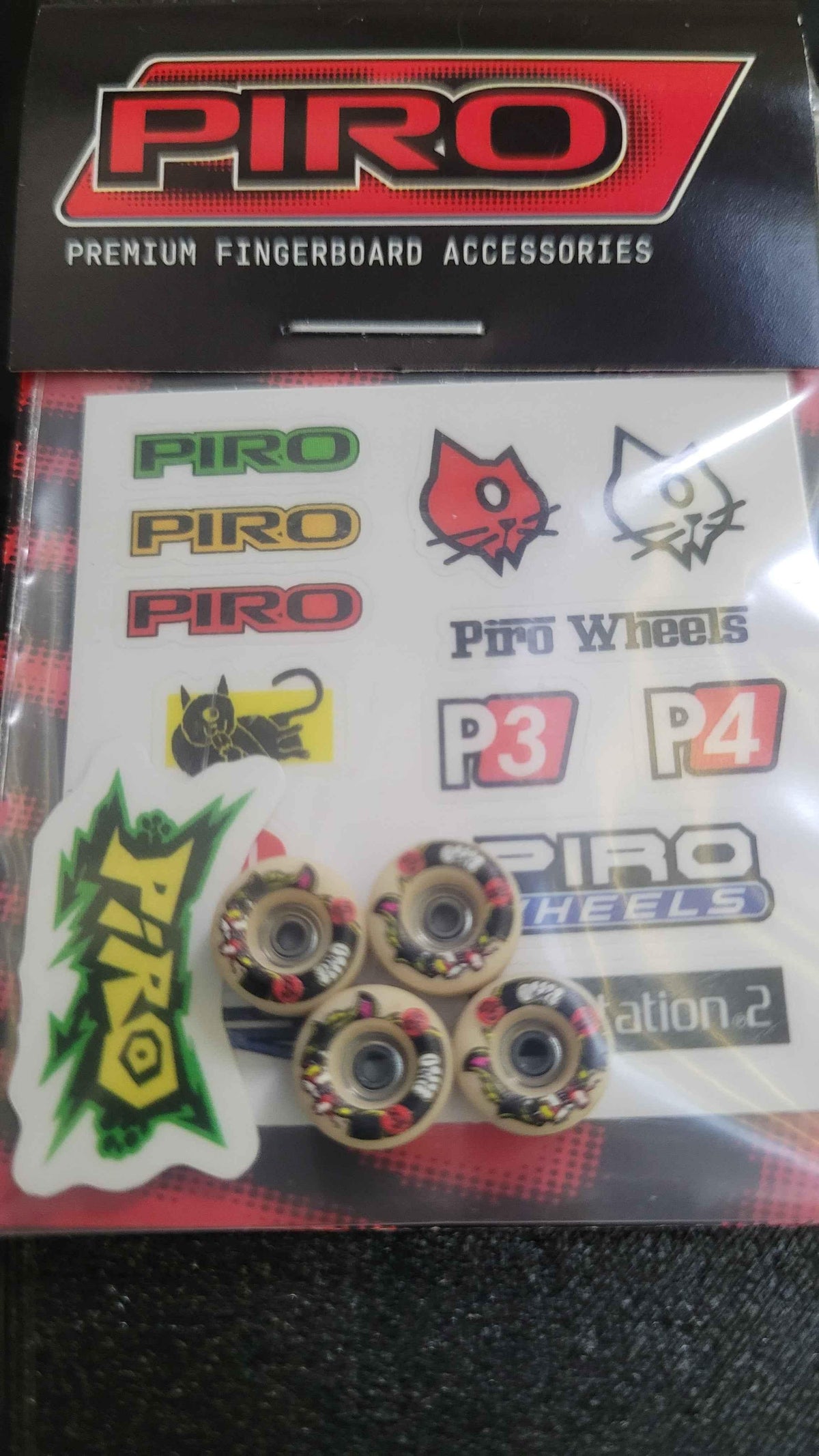 Piro premium fingerboard accessories set with wheels, stickers, and P3 P4 branding.