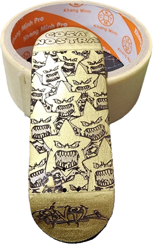 Custom handmade fingerboard deck with gold star and monster graphic design.