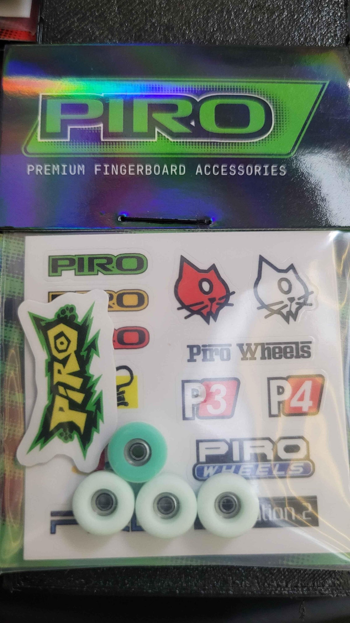 Piro premium fingerboard wheels set with brand stickers and accessories.