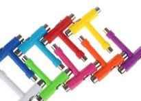 Assorted colorful fingerboard accessories and tools in various bright colors.