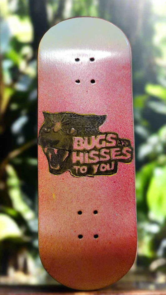 Custom fingerboard deck with red gradient finish and 'Bugs and Hisses to You' graphic.