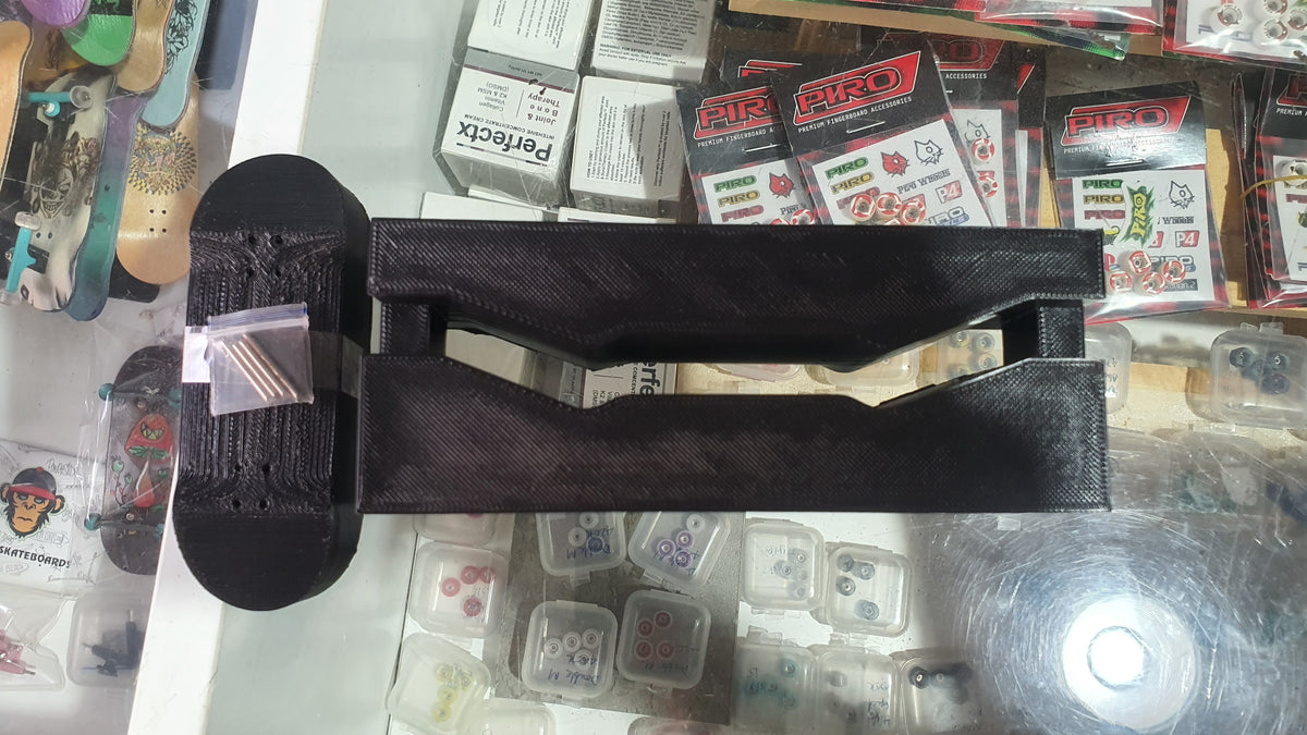 Black custom mold base with long bar section and rounded side openings