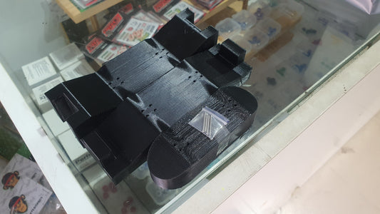 Black custom mold with stacked blocks and smooth curved base