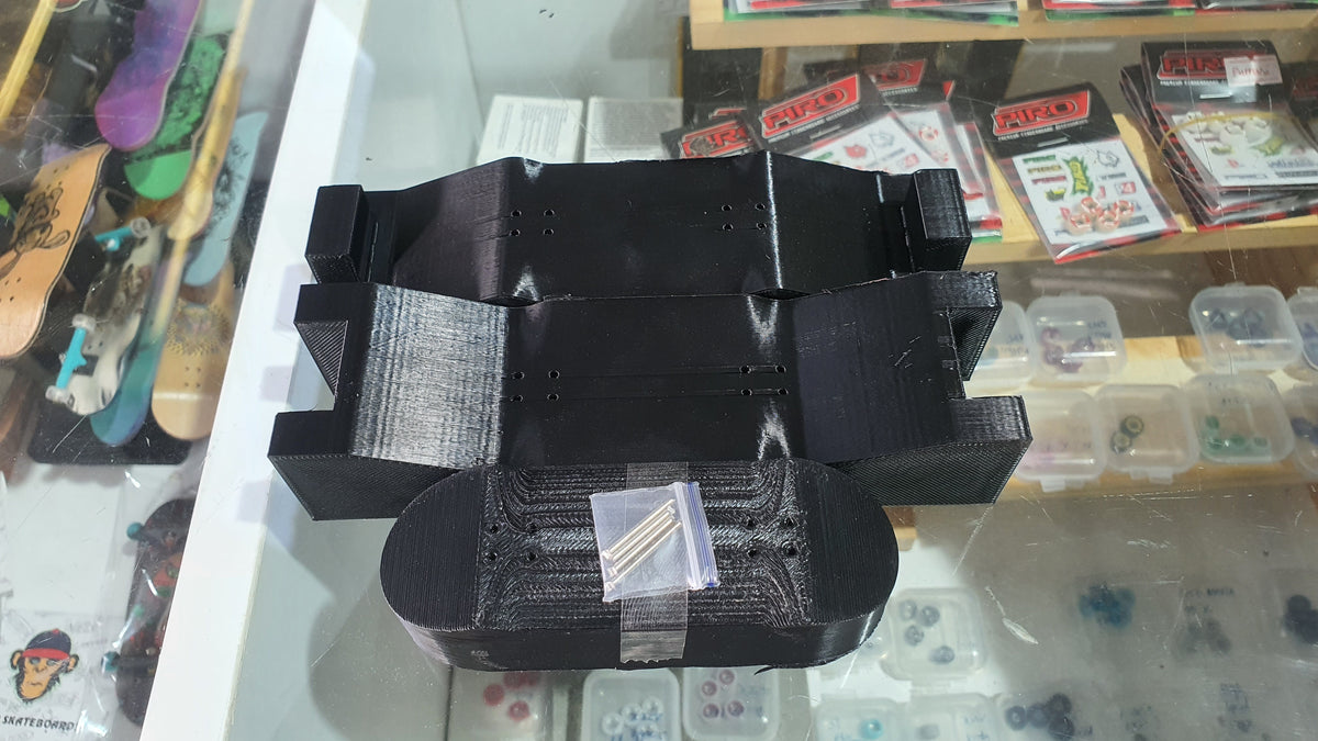 Black custom mold with square side blocks and curved front base
