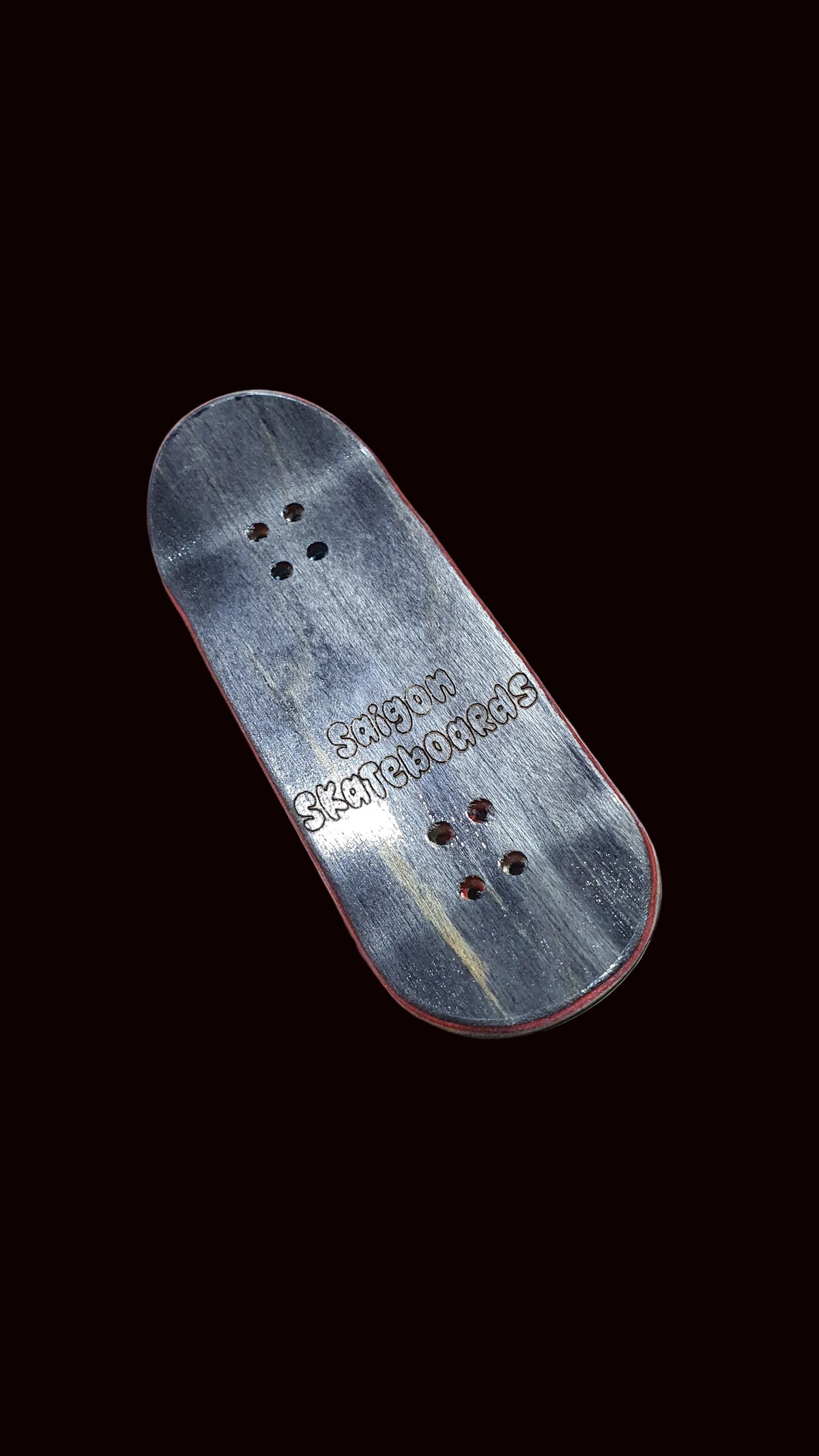 Skateboard fingerboard deck, gray top with cat graphic and grip holes