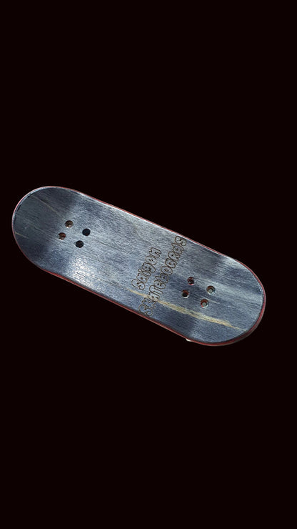 Skateboard fingerboard deck, angled gray top with cat graphic and grip holes