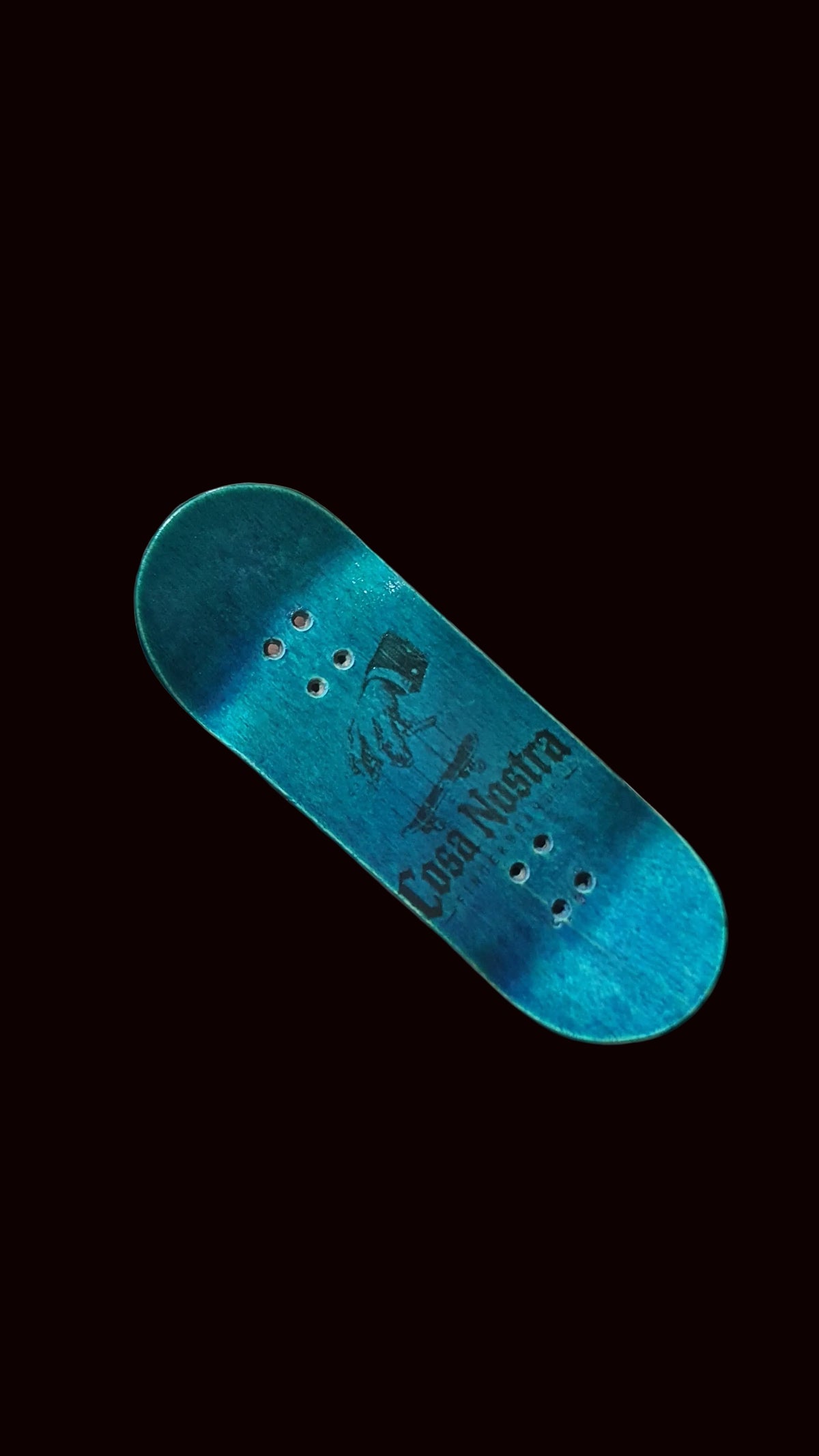 Blue teal fingerboard deck, angled underside with graphic print and mounting holes.