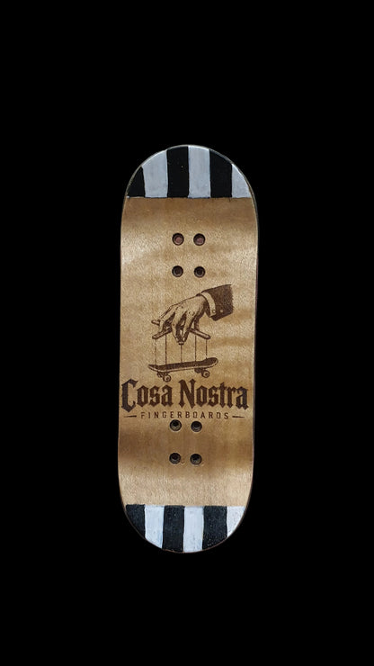 Skateboard deck bottom with tan grip, Cosa Nostra text, and animal graphic