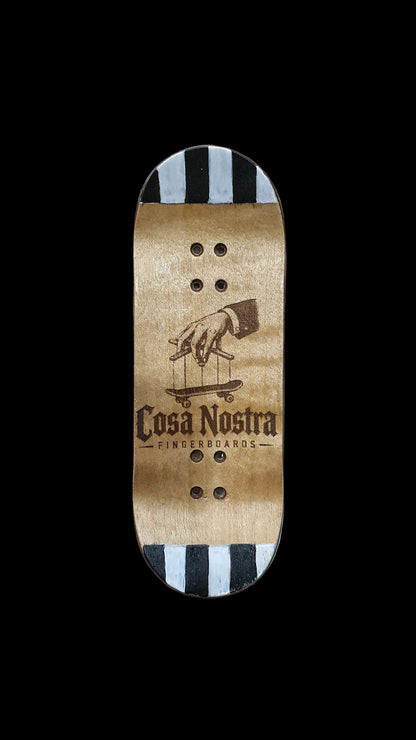 Skateboard deck bottom with tan grip, striped top, and tree graphic
