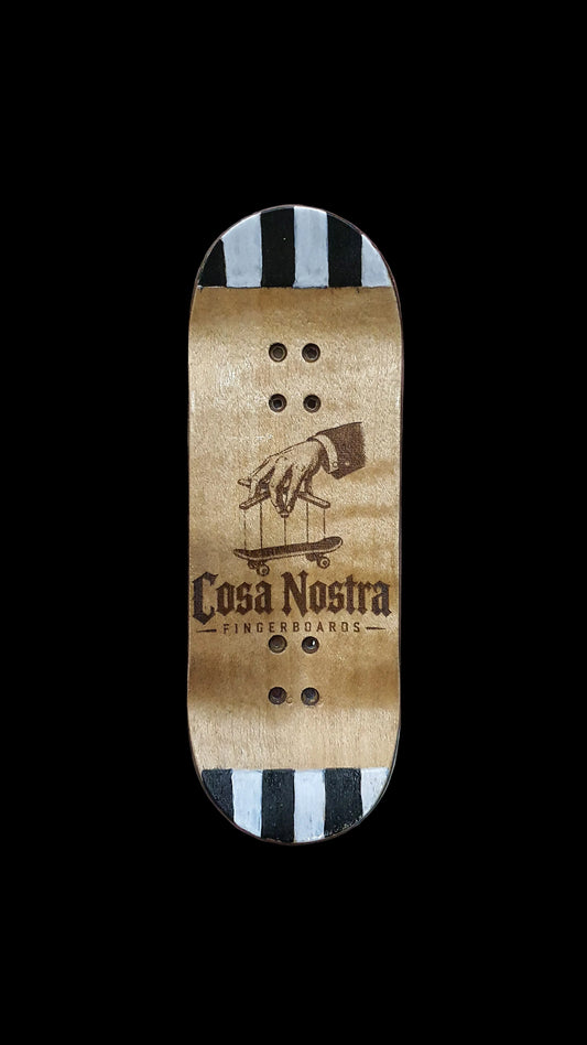 Skateboard deck bottom with tan grip, striped top, and tree graphic