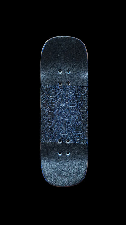 Fingerboard deck top with dark blue patterned grip and eight mounting holes