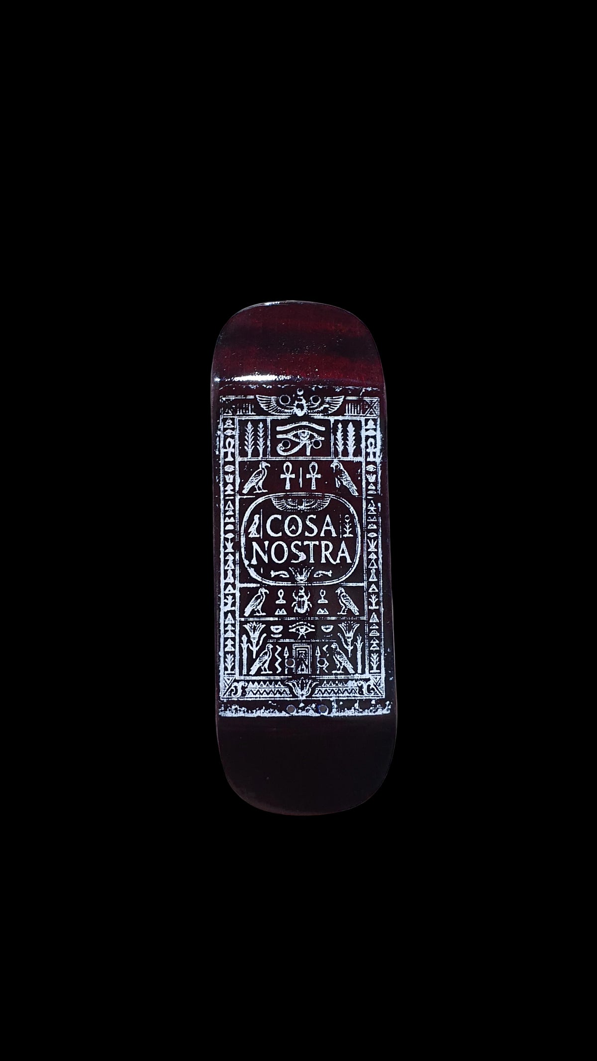 Fingerboard deck underside with red-brown finish and centered white Cosa Nostra design