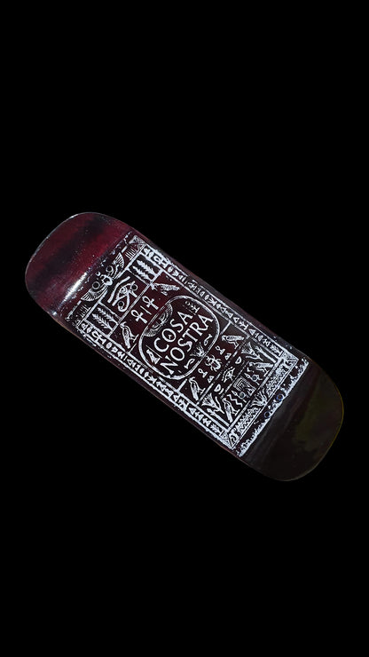 Cosa Nostra fingerboard deck with ornate white graphic, shown at an angle