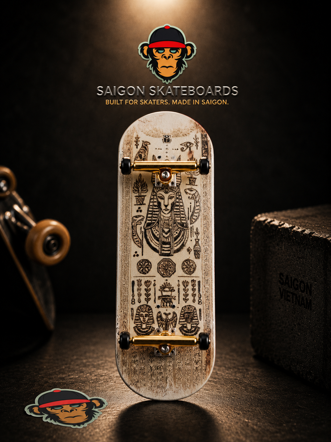 Skateboard deck with intricate Egypitician designs on a dark background, featuring Saigon Skateboards logo.
