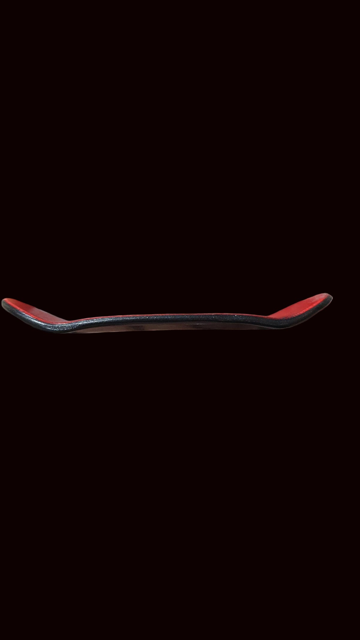 Fingerboard skateboard deck, dark top with red side rails