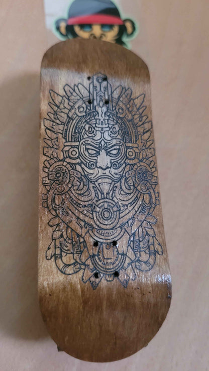 Elevate Your Skills with the Ornate Aztec Warrior Fingerboard Deck - 34mm
