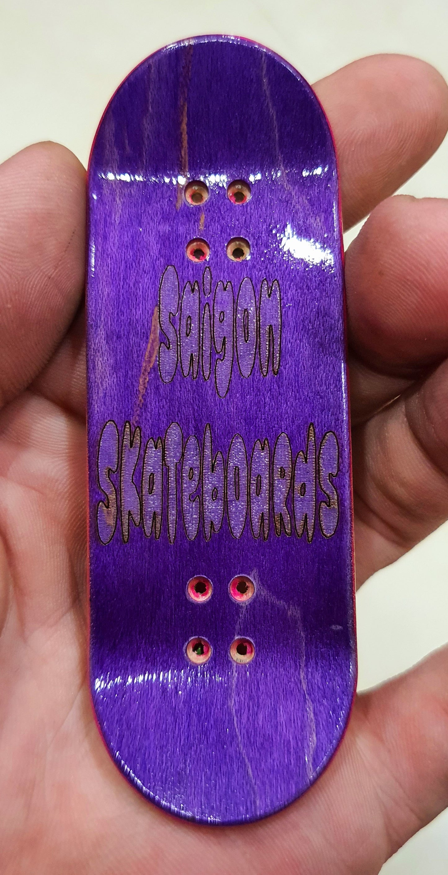 Saigon Skateboards "Raging Stars" 5-ply Canadian Maple Fingerboard.  33mmx97mm  Popsicle, medium kicks and concave.