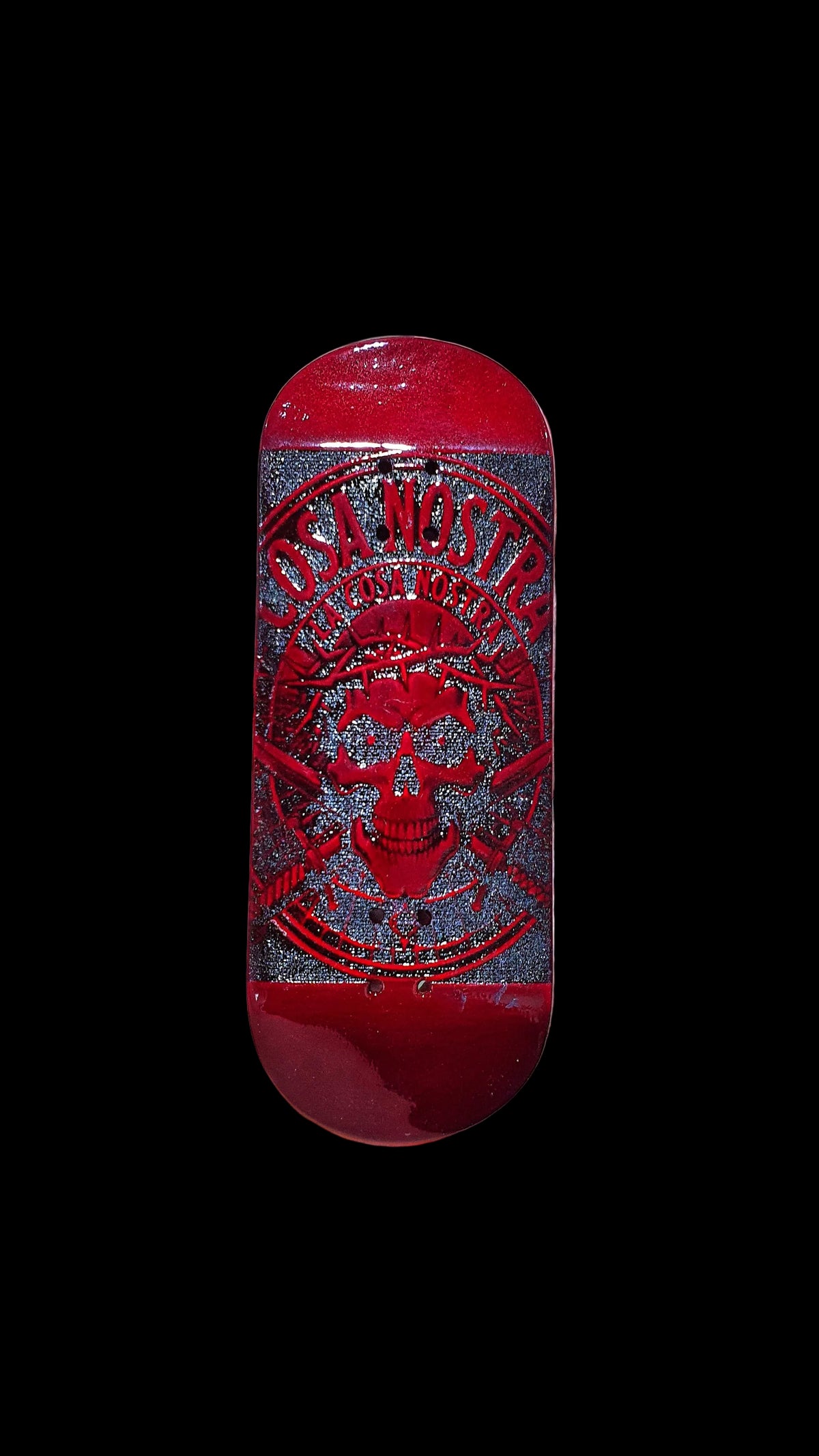 Red fingerboard deck front view with Cosa Nostra skull emblem