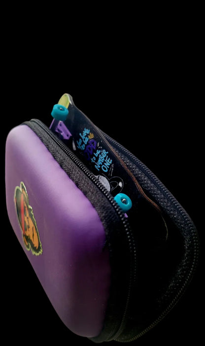 Purple zip case for a fingerboard, with side graphic and black zipper.