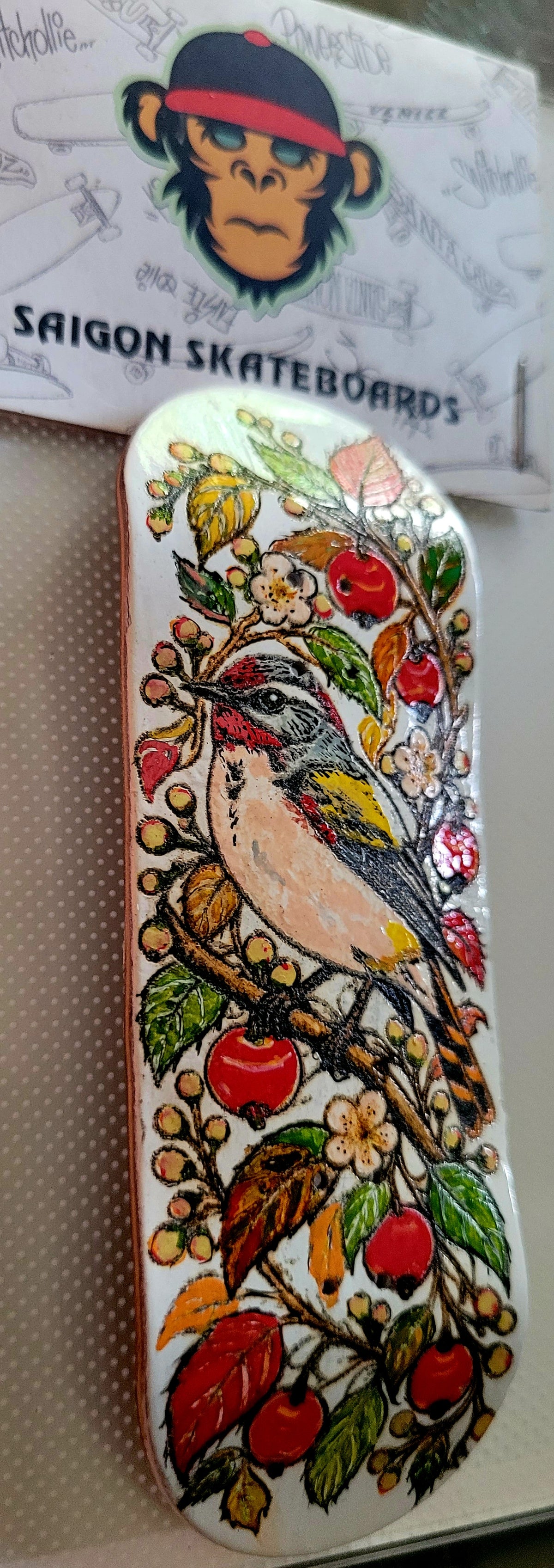 Bird graphic fingerboard deck, oval shape