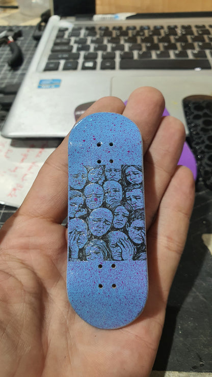 Saigon Skateboards 34mmx97mm 5-ply Canadian Maple Fingerboard "Faces of sadness "