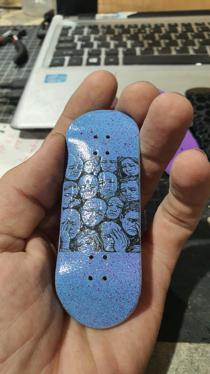 Saigon Skateboards 34mmx97mm 5-ply Canadian Maple Fingerboard "Faces of sadness "