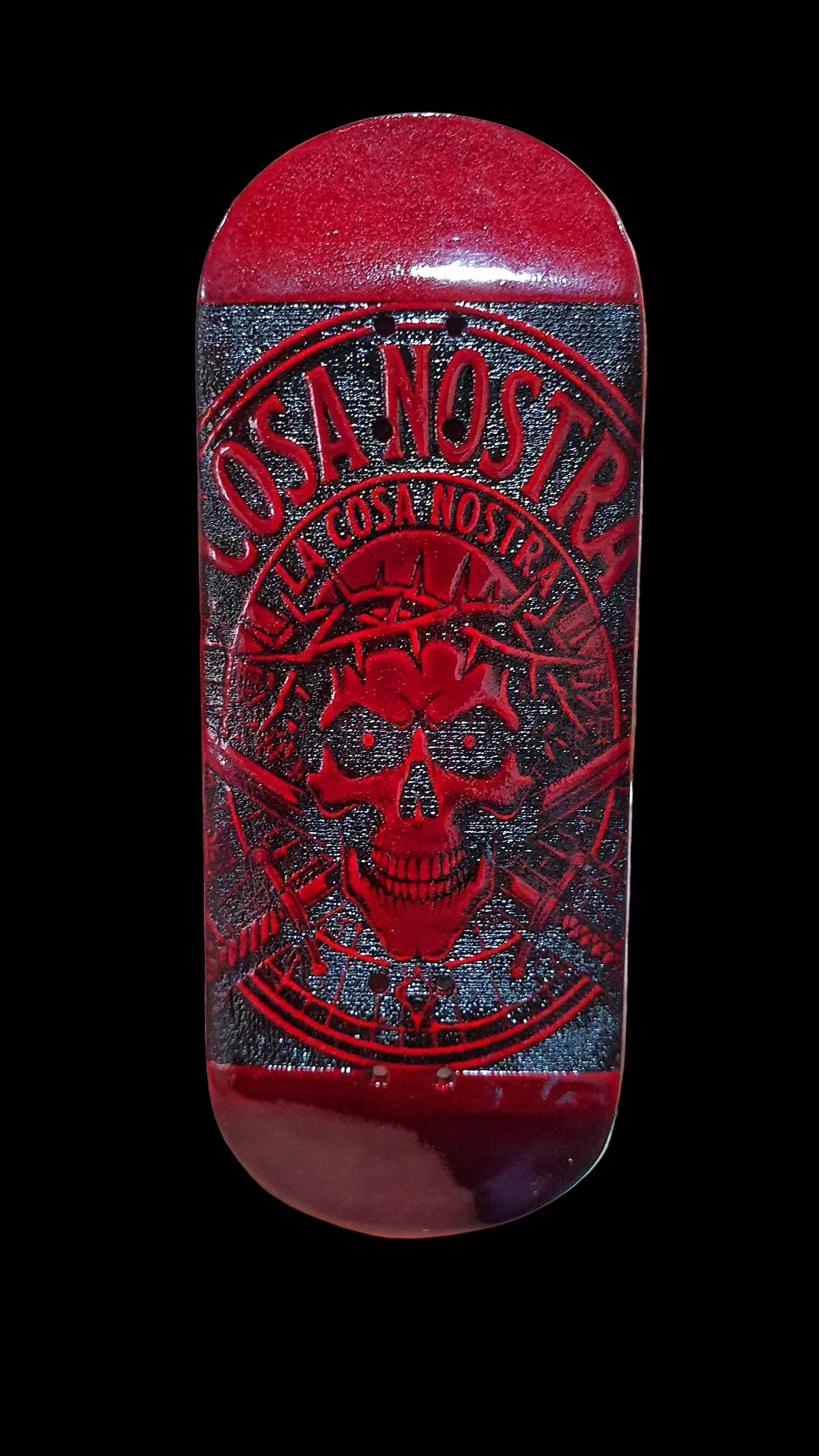 Red fingerboard deck with large Cosa Nostra skull emblem in black