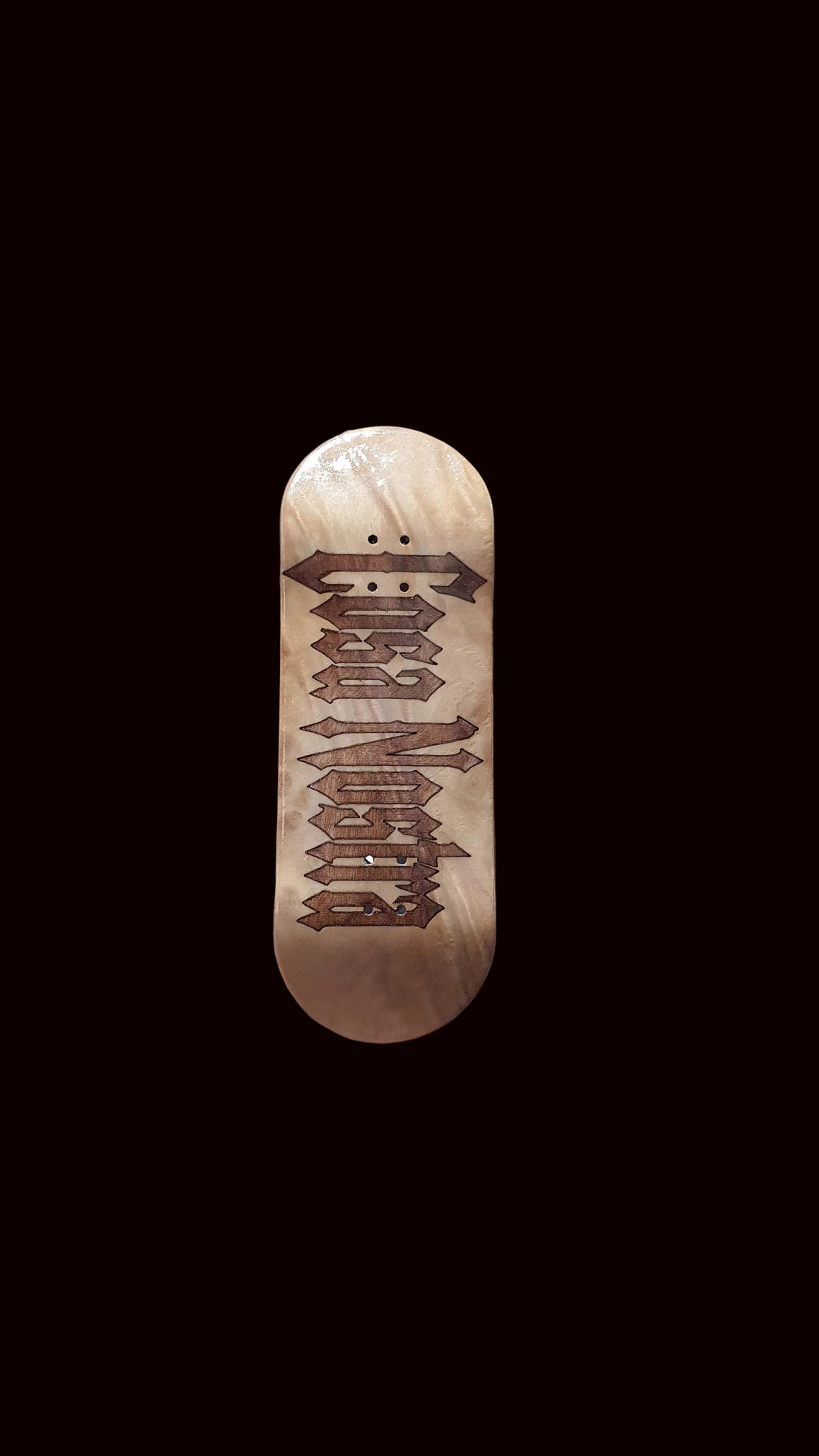 Natural wood fingerboard deck with vertical brown logo graphic