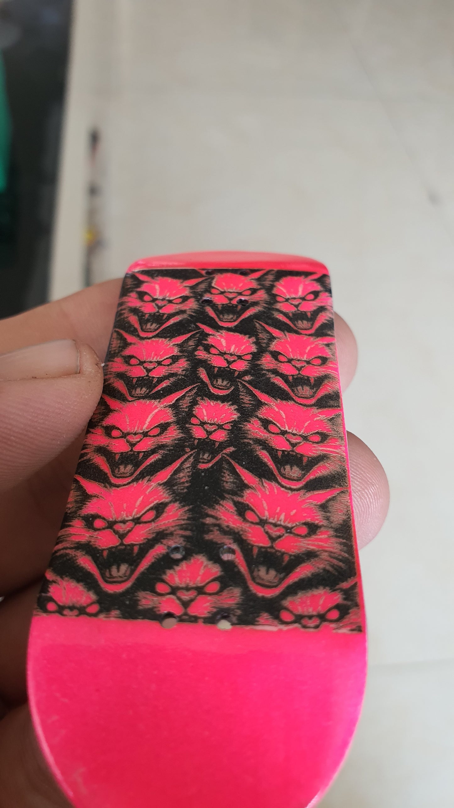 Saigon Skateboards "Pink cats" 5-ply Canadian Maple Fingerboard 33.3mmx98mm popsicle shape. Medium kicks and concave.