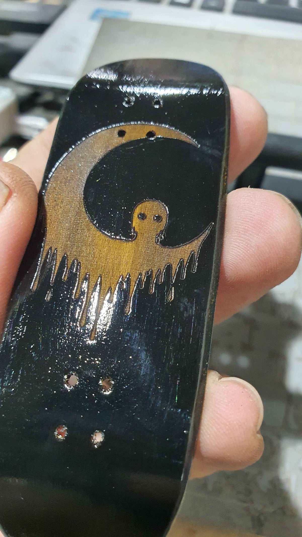 Achieve Precision and Style with the Saigon Skateboards Man in the Moon 34mm Fingerboard Deck