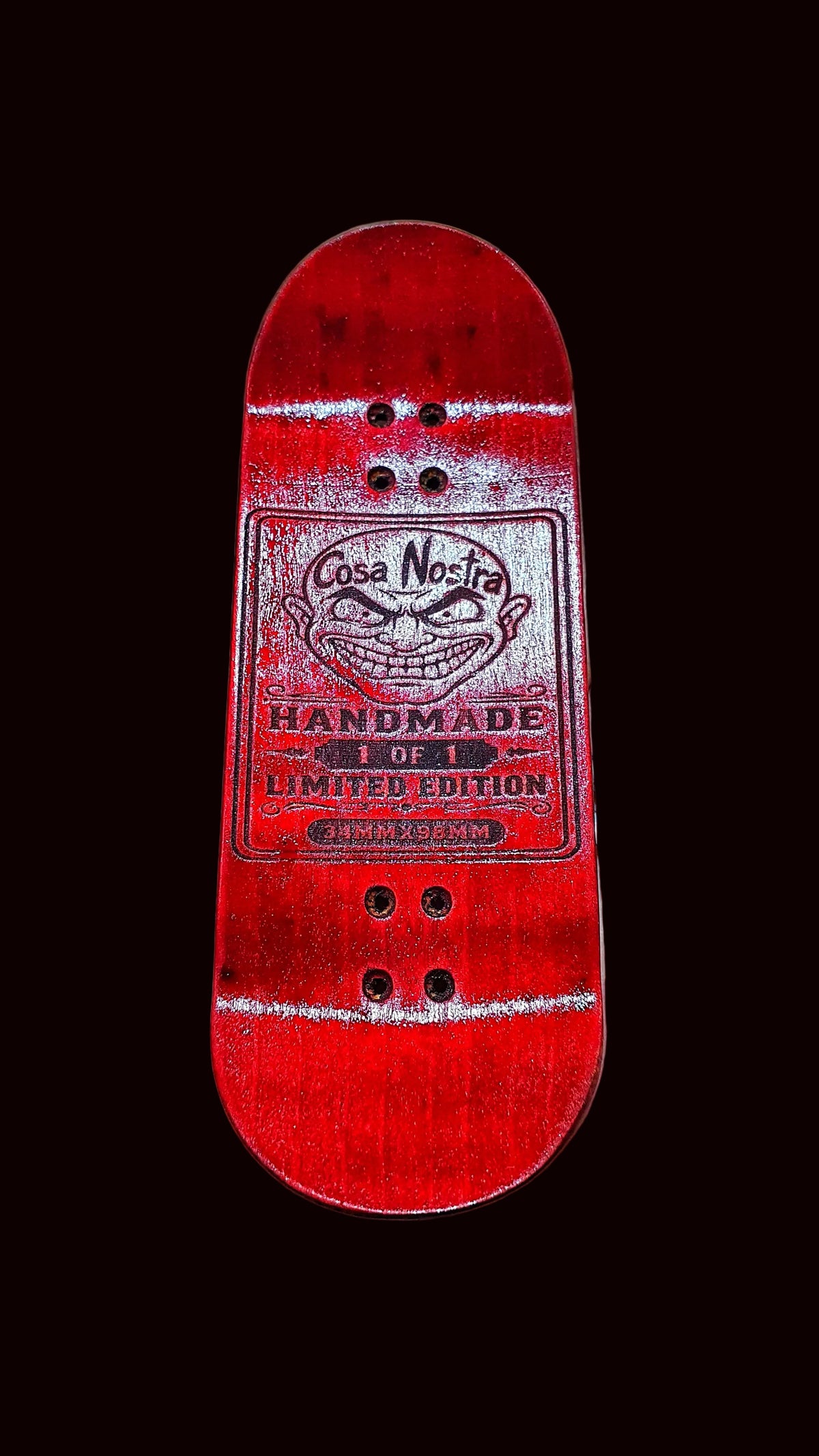 Red fingerboard deck with Cosa Nostra Handmade Limited Edition graphic and 4 screw holes