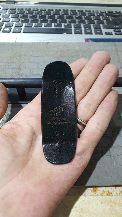Achieve Precision and Style with the Saigon Skateboards Man in the Moon 34mm Fingerboard Deck