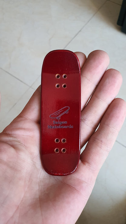 Saigon Skateboards 5-ply Canadian Maple "Blood" logo board. 32×97mm boxy shape. Medium kicks. High gloss finish.
