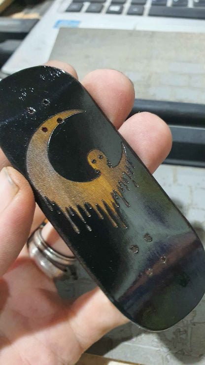 Achieve Precision and Style with the Saigon Skateboards Man in the Moon 34mm Fingerboard Deck