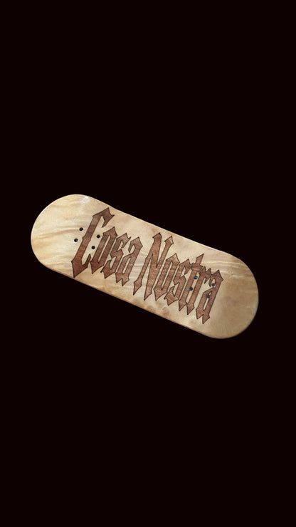Natural wood fingerboard deck with brown logo graphic on top